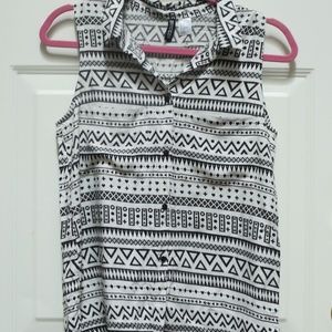 Black and White patterned sleeveless button up top